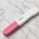 PT-KIT-001 pregnancy test stick in use