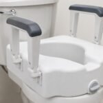 Raised Toilet Seat with Handles in use